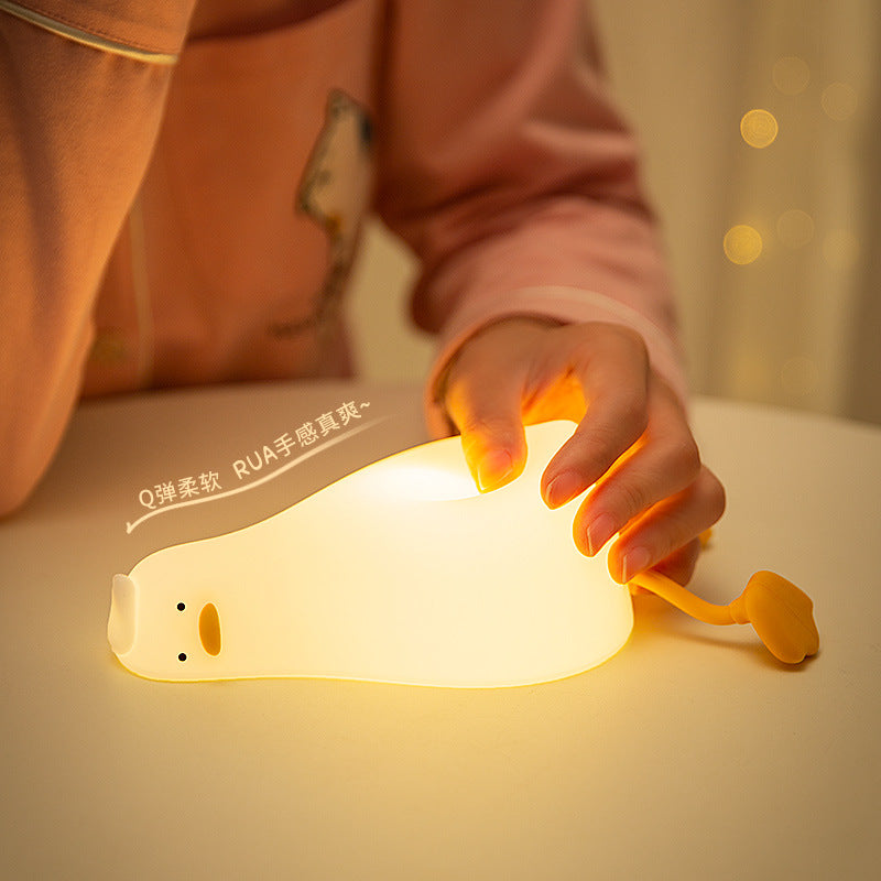 Fun lying flat duck turning over duck silicone night light creative silicone LED night light charging model fun phone holder