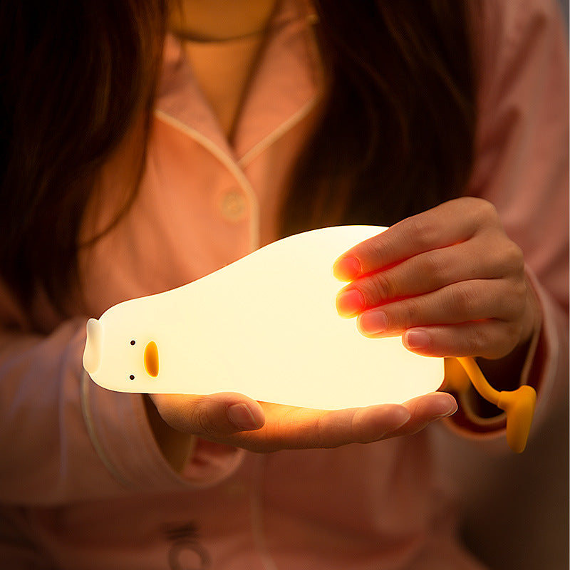 Fun lying flat duck turning over duck silicone night light creative silicone LED night light charging model fun phone holder